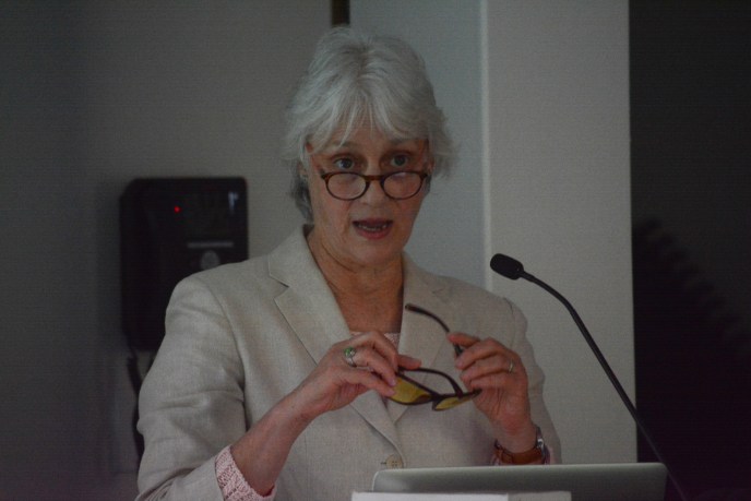 Patti Wood, the head of the Port Washington-based Grassroots Environmental Education group, shows a pair of specially-tinted glasses meant to protect people's eyes from blue light. (Photo by Janelle Clausen)