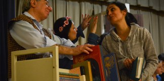 Lillian Rokhsar and Robert Aizer, rehearsing their respective roles of Belle and bookseller, will appear in Temple Israel's upcoming performance of Beauty and the Beast. (Photo by Janelle Clausen)