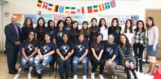 Members of the North High School Asian Culture Club and the Multicultural Club, led by North High teachers Maggie Wu and Susanne Marcus, respectively, visit John F. Kennedy School to perform for students. The North High guests are photographed here with JFK Principal Ron Gimondo, Assistant Principal Kathleen Murray, and ENL teachers Amy Kubel and Christine Ahl. (Photo courtesy of the Great Neck Public Schools)