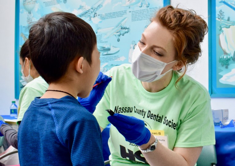 Dentists volunteer to help ‘Give Kids a Smile’ Dentists volunteer to help ‘Give Kids a Smile’
