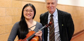 North High violist Megan Xu, chosen for the Honor Orchestra of America, and Mr. Joseph Rutkowski, director of instrumental music at North High. (Photo courtesy of the Great Neck Public Schools)