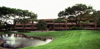 The former Astoria Bank headquarters, as seen here in a promotional flyer, will be acquired by Northwell Health. (Photo courtesy of Newmark Knight Frank)