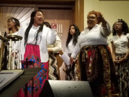 Members of the Voice of Virtue, Inc. youth choir perform before Temple Israel congregants. They had also sang at a Martin Luther King Jr. commemoration in Great Neck earlier this year. (Photo by Janelle Clausen)