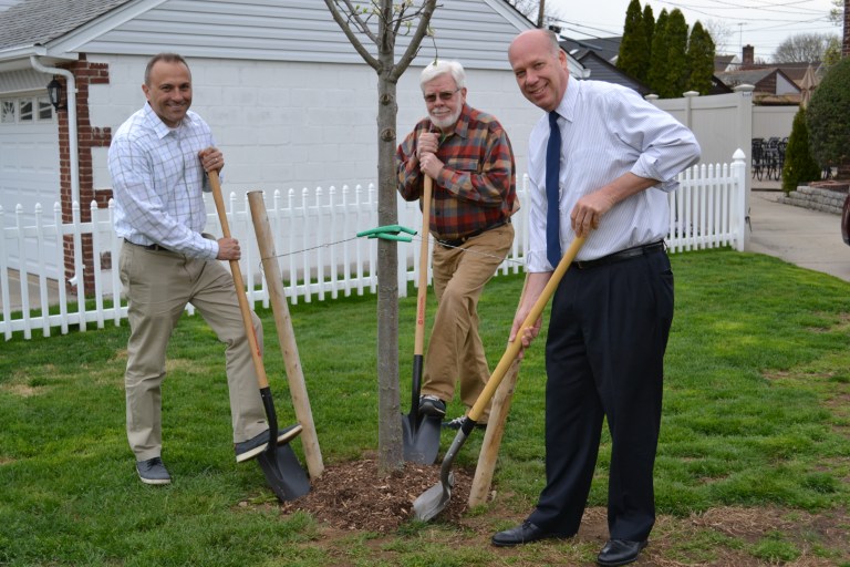 Mineola board plants tree for Arbor Day