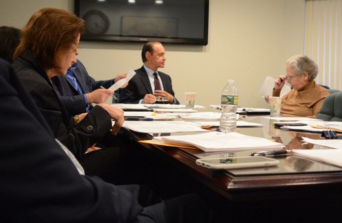 Members of the Water Authority of Great Neck North meet to discuss future projects, a newsletter and other matters. (Photo by Janelle Clausen)