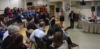 Superintendent of Schools Teresa Prendergast, along with Assistant Superintendent for Business John Powell, discuss the adopted 2018-19 budget with residents and administrators. (Photo by Janelle Clausen)