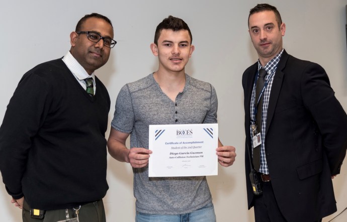 Diego Garcia Guzman of Great Neck is congratulated on being named Student of the Quarter byNassau BOCES Barry Tech Assistant Principals Shaun Sudama and Patrick Dunphy. (Photo courtesy of Nassau BOCES)