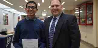 Vijay Paliath is pictured with Mineola High School Principal Whittney Smith. (Photo courtesy of Mineola Union Free School District)