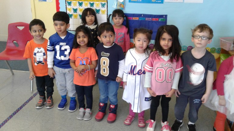 Preschoolers foot for home teams on sports shirt day Preschoolers foot for home teams on sports shirt day
