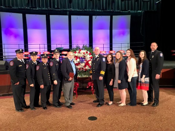 Company members and family members pictured with Mickey Groene, Doris’s husband are: Ex-Chief and Trustee Daniel Going, Chaplain Rabbi Marim Charry, Ex-Chief Edward Canfield, Chief of Department Joshua Charry, Mickey Groene, Port Washington Fire Department Ex-Chief Tom McDonough, Sr., Doris’s son, Donna Curci, Kelly McDonough, Erin McDonough, Katherine Geldert and Tom McDonough, Jr. (Photo courtesy of Vigilant Fire Company)