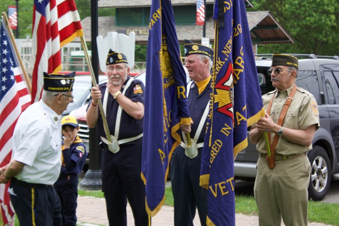 The color guard prepares to advance on Memorial Day at the East Williston Village Green. (Photo by Gretchen Keller)