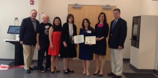 Board of Trustees members Robert Schaufeld and Joel Marcus, Councilwoman Anna Kaplan, Councilwoman Lee Seeman, Library Director Denise Corcoran, Legislator Ellen Birnbaum, and Assistant Superintendent for Secondary Education, Great Neck Public Schools, Stephen Lando atttended the Great Neck Library ribbon cutting for the new RFID self checkout . (Photo courtesy of the Great Neck Library)