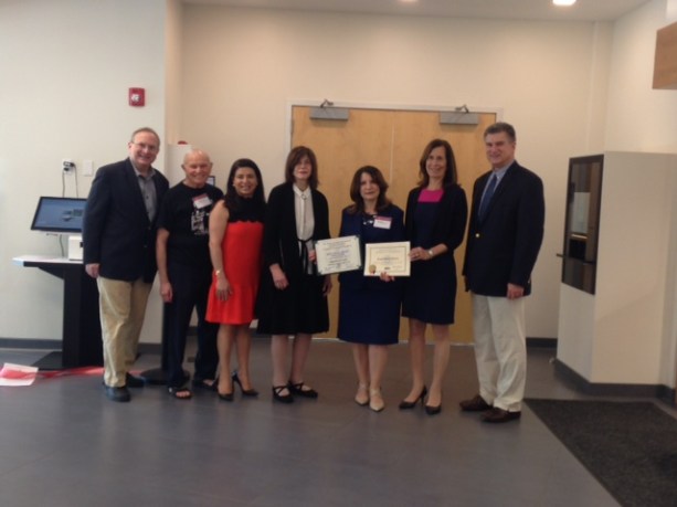 Board of Trustees members Robert Schaufeld and Joel Marcus, Councilwoman Anna Kaplan, Councilwoman Lee Seeman, Library Director Denise Corcoran, Legislator Ellen Birnbaum, and Assistant Superintendent for Secondary Education, Great Neck Public Schools, Stephen Lando atttended the Great Neck Library ribbon cutting for the new RFID self checkout . (Photo courtesy of the Great Neck Library)