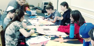 Students at the Lake Success Jewish Center are guided through an art project. (Photo courtesy of the Lake Success Jewish Center Hebrew School)