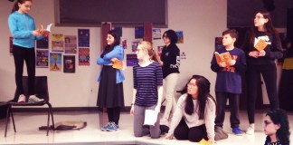 Dana Kagan, Sara Rafaeil, Phoebe Gordon, Sara Chitsaz, Joy Chang, Jack Brenner, Simona Fine and Julian Malater, the cast of “CLUE: The Musical” rehearse for their May and June performances. (Photo courtesy of the Great Neck Library)