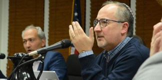 Bart Sobel, seen here in a March meeting, and Norman Namdar, face a challenge from Perry Spector. (Photo by Janelle Clausen)