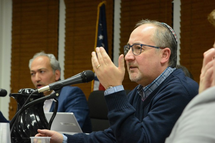 Bart Sobel, seen here in a March meeting, and Norman Namdar, face a challenge from Perry Spector. (Photo by Janelle Clausen)