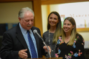 Interim Principal Michael Mensch discusses the qualifications of Meredith Moss and Colleen Guarneiri, a general special education teacher and English as a Second Language teacher, with the board and the public. (Photo by Janelle Clausen)