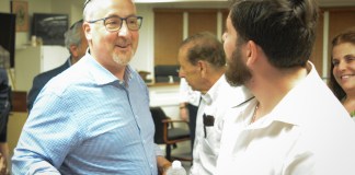 Deputy Mayor Bart Sobel speaks with challenger Perry Spector after the election results are announced. (Photo by Janelle Clausen)