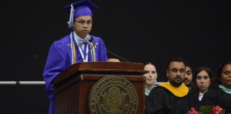 Adrian-James Gevero, the salutatorian of Sewanhaka High School's class of 2018, speaks before more than 200 colleagues and hundreds more in attendance. (Photo by Janelle Clausen)