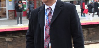 LIRR President Phillip Eng greeting commuters at the Mineola train station. (Photo by Rebecca Klar)