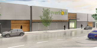 The renovated facade for Everfresh on Middle Neck Road would utilize wood cladding, textured stone panels and aluminum. (Photo rendering from Mojo Stumer)