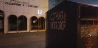 One of the collection bins that Great Neck Plaza trustees hope to regulate sits in front of the old Stanton Cleaners site at the end of Cuttermill Road. (Photo by Janelle Clausen)