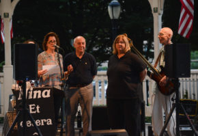 Mayor Jean Celender, with Trustees Gerry Schneiderman and Pam Marksheid, speak with attendees before the show begins. (Photo by Janelle Clausen)