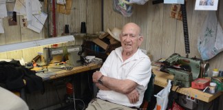 John Cinciripini, 83, said he will soon be retiring after nearly 50 years of working as a tailor in Great Neck. (Photo by Janelle Clausen)