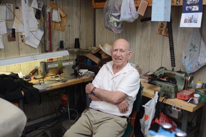 John Cinciripini, 83, said he will soon be retiring after nearly 50 years of working as a tailor in Great Neck. (Photo by Janelle Clausen)
