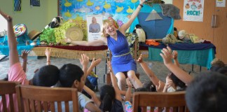 Award winning actor, recording artist and author LuAnn Adams leads a group of children on a storytelling journey in the Hillside Public Library. It is one of several libraries to offer storytelling programs. (Photo by Janelle Clausen)