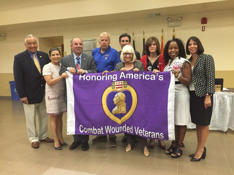Town Board receive flag honoring Purple Heart veterans