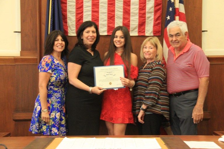 Singas honors Roslyn student with SHIELD Award