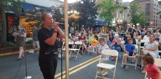 Residents competed in a karaoke contest to try and win gift cards for Great Neck Plaza businesses. (Photo by Maylan Residents competed in a karaoke contest to try and take home gift cards for Great Neck Plaza businesses. (Photo by Maylan A duo performs before a live Great Neck Plaza audience. (Photo by Maylan L. Studart)