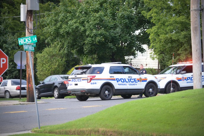 Police block off the route to North Road, where police say a woman was stabbed. Her death is being investigated by the Homicide Squad. (Photo by Janelle Clausen)