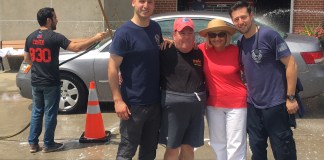 First Assistant EMS Chief Joseph Oginsky, Erin Lipinsky, Supervisor Judi Bosworth and Steve Shapiro at a car wash benefiting Special Olympics New York. (Photo courtesy of the Town of North Hempstead)