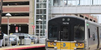 A train pulls into the Mineola Long Island Rail Road station. (Photo by Rebecca Klar)