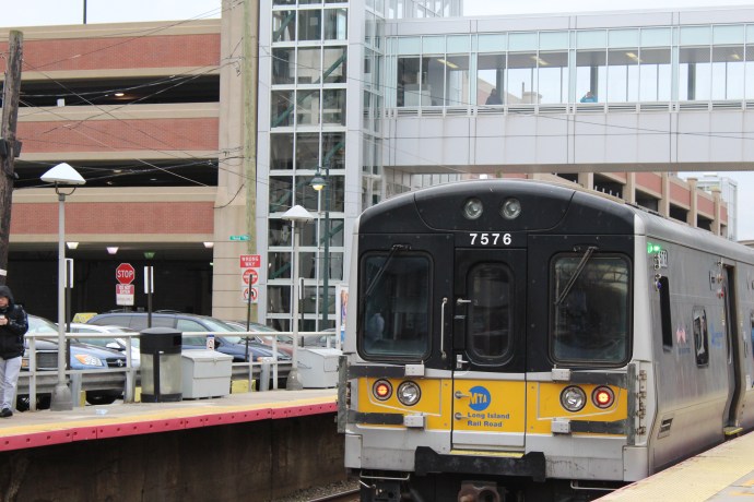 A train pulls into the Mineola Long Island Rail Road station. (Photo by Rebecca Klar)