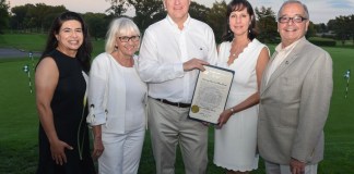 Town Councilwoman Anna M. Kaplan, Town Supervisor Judi Bosworth, and honorees Lori and Steve Scrobe with Assemblyman Anthony D’Urso. (Photo courtesy of Assemblyman Anthony D'Urso's office)