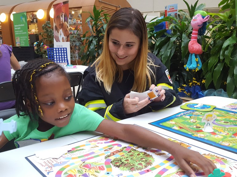 Firefighters and patients bond over games at children’s hospital