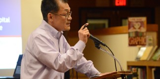 Great Neck resident Bill Lin, who said he has spent most of his adult life in the corporate world, said the board's decision to install a parking lot was based on anecdotes rather than data. (Photo by Janelle Clausen)