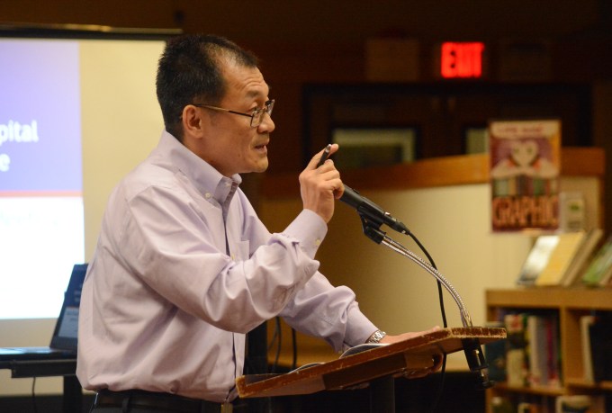 Great Neck resident Bill Lin, who said he has spent most of his adult life in the corporate world, said the board's decision to install a parking lot was based on anecdotes rather than data. (Photo by Janelle Clausen)