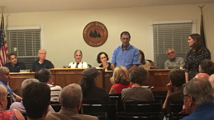 Representatives from Lockheed Martin address residents of Russell Gardens about concerns of a spreading groundwater plume. (Photo by Jessica Parks)