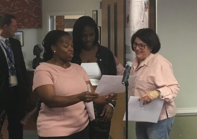Roslyn track and field coach Vera Trenchfield and Meryl Waxman Ben-Levy praised student athlete Natya Glasco. (Photo by John Nugent)