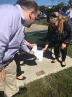 The Nocito family unveils the memorial plaque. (Photo by John Nugent)