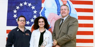 Sophia Wotman is congratulated by South High School Performing Arts Department Head Michael Schwartz and Principal Christopher Gitz. (Photo courtesy of the Great Neck Public Schools)