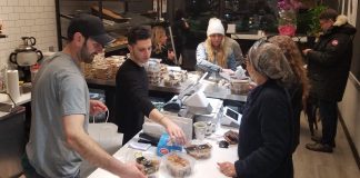 People lined up to get a taste of all sorts of pastries imported straight from Israel on Wednesday, the day after the restaurant's grand opening. (Photo by Janelle Clausen)