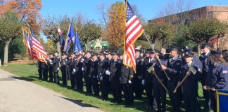 Members of Great Neck‘s fire departments marched in the Veterans Day parade and paid tribute to those who have served. (Photo by John Nugent)