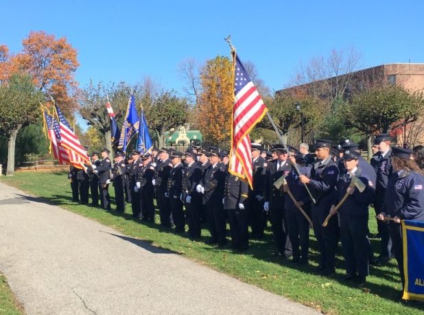 Members of Great Neck‘s fire departments marched in the Veterans Day parade and paid tribute to those who have served. (Photo by John Nugent)