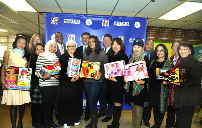 Administrators, trustees and drive participants show some of the donations. (Photo by William Cancellare)